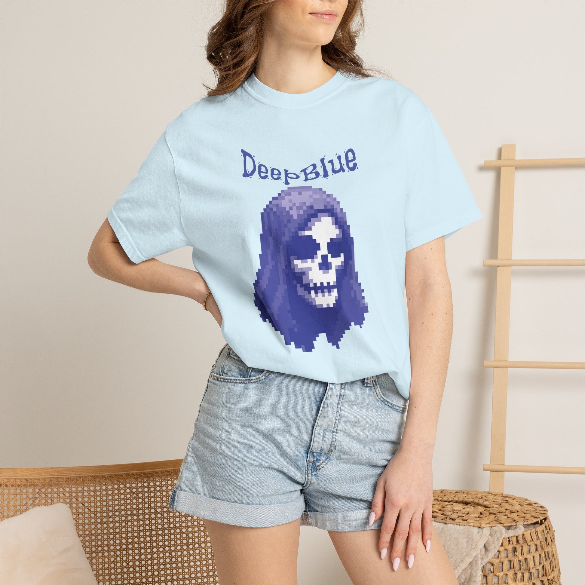 Deep Blue pirate graphic shirt hanging outdoors in coastal environment

