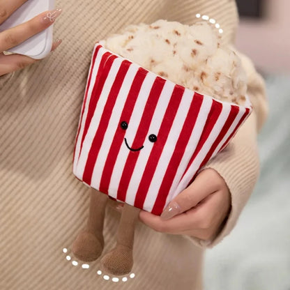 Detailed view of popcorn plush embroidered happy face