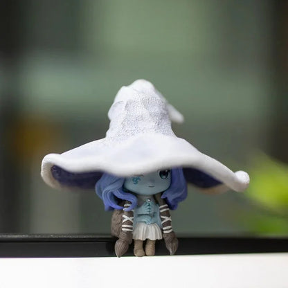 Detailed witch collectible figure displaying mystical dark moon aesthetic
