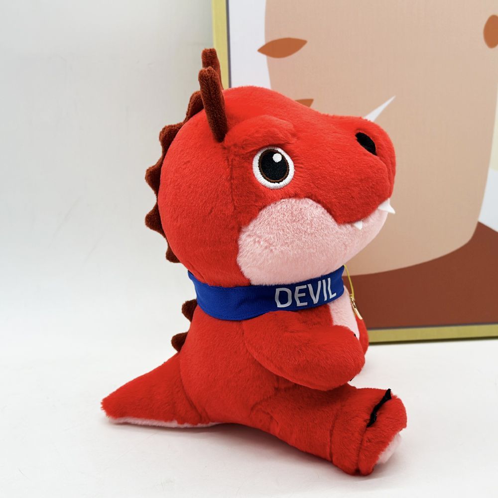 Devil dinosaur collectible plush close-up detail shot
