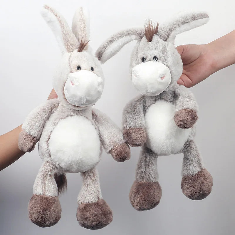 Donkey stuffed animal displayed on a nursery shelf as room decor