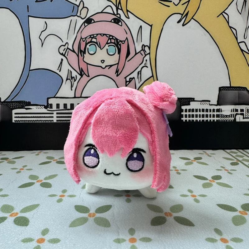 Doro plush keychain 10cm size comparison next to a coin