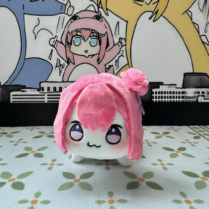 Doro plush keychain 10cm size comparison next to a coin