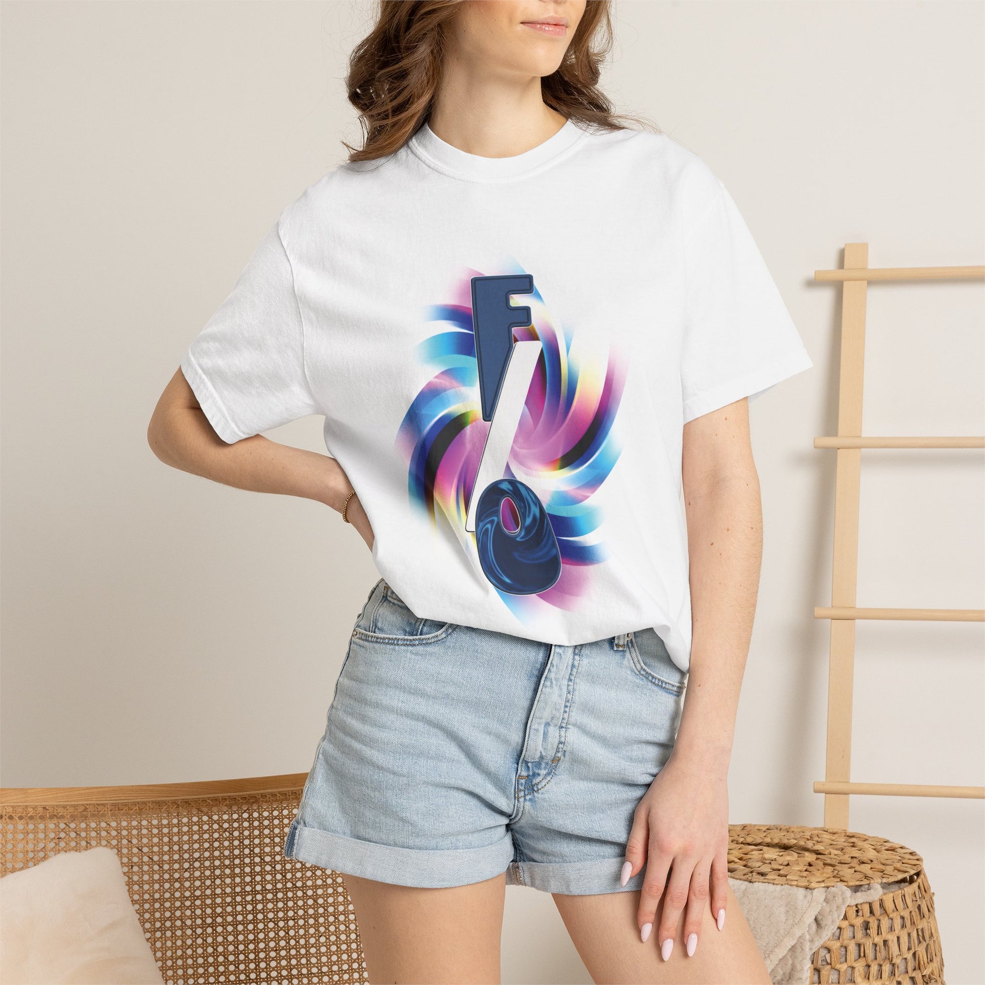 F/O graphic tee close-up showing metallic gradient swirl, fan culture streetwear detail
