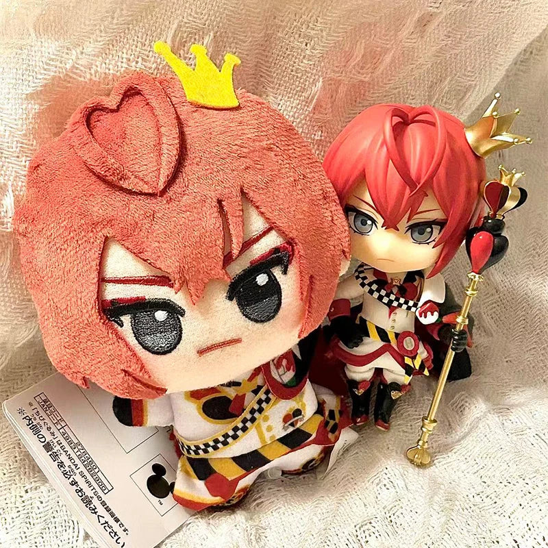Fan art plush toy with embroidered facial features close up
