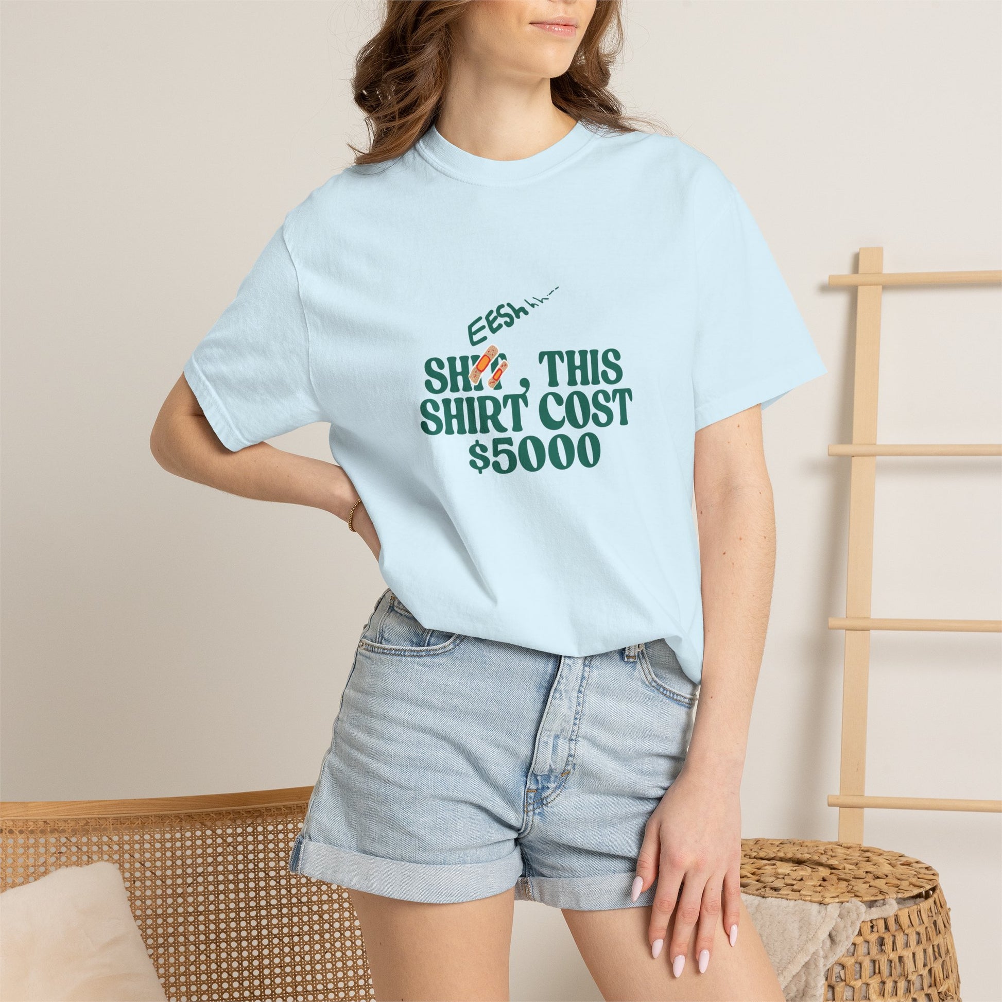 Female model styled casually in white oversized statement tee