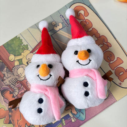 Festive plush doll kawaii snowman sitting on wooden shelf winter decor