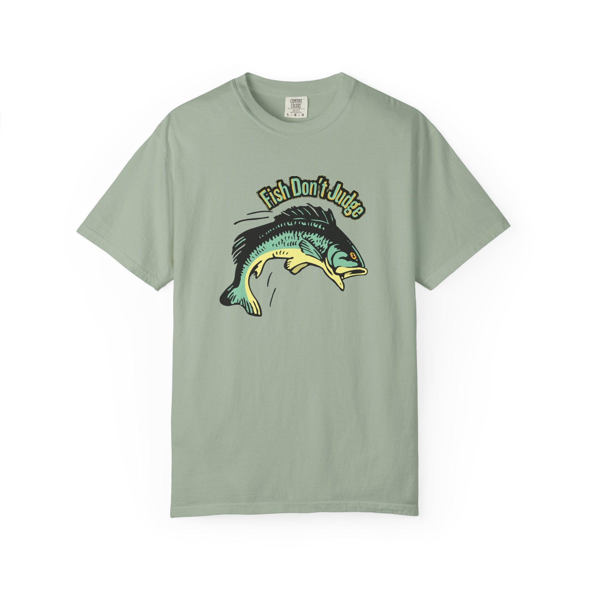 Fish Don't Judge t-shirt worn by angler at lake at dawn
