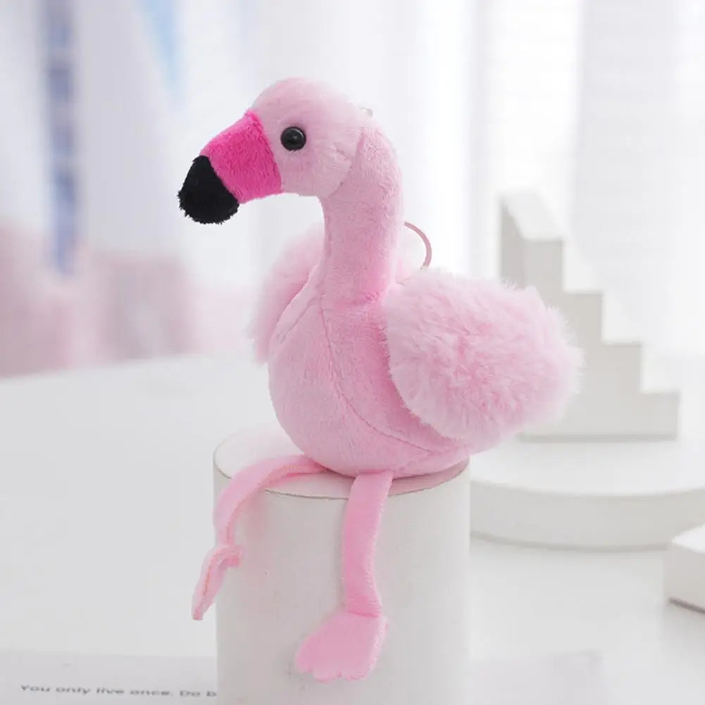 Flamingo toy close up detail shot showing fluffy soft plush texture in vivid pink colorway
