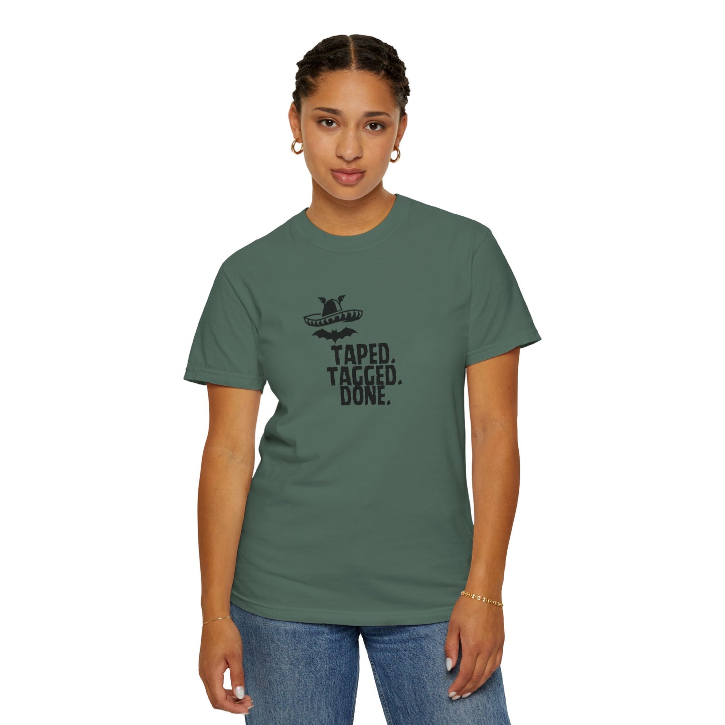 Flat lay of The Midnight Mariachi funny Mexican graphic tee with sneakers and accessories
