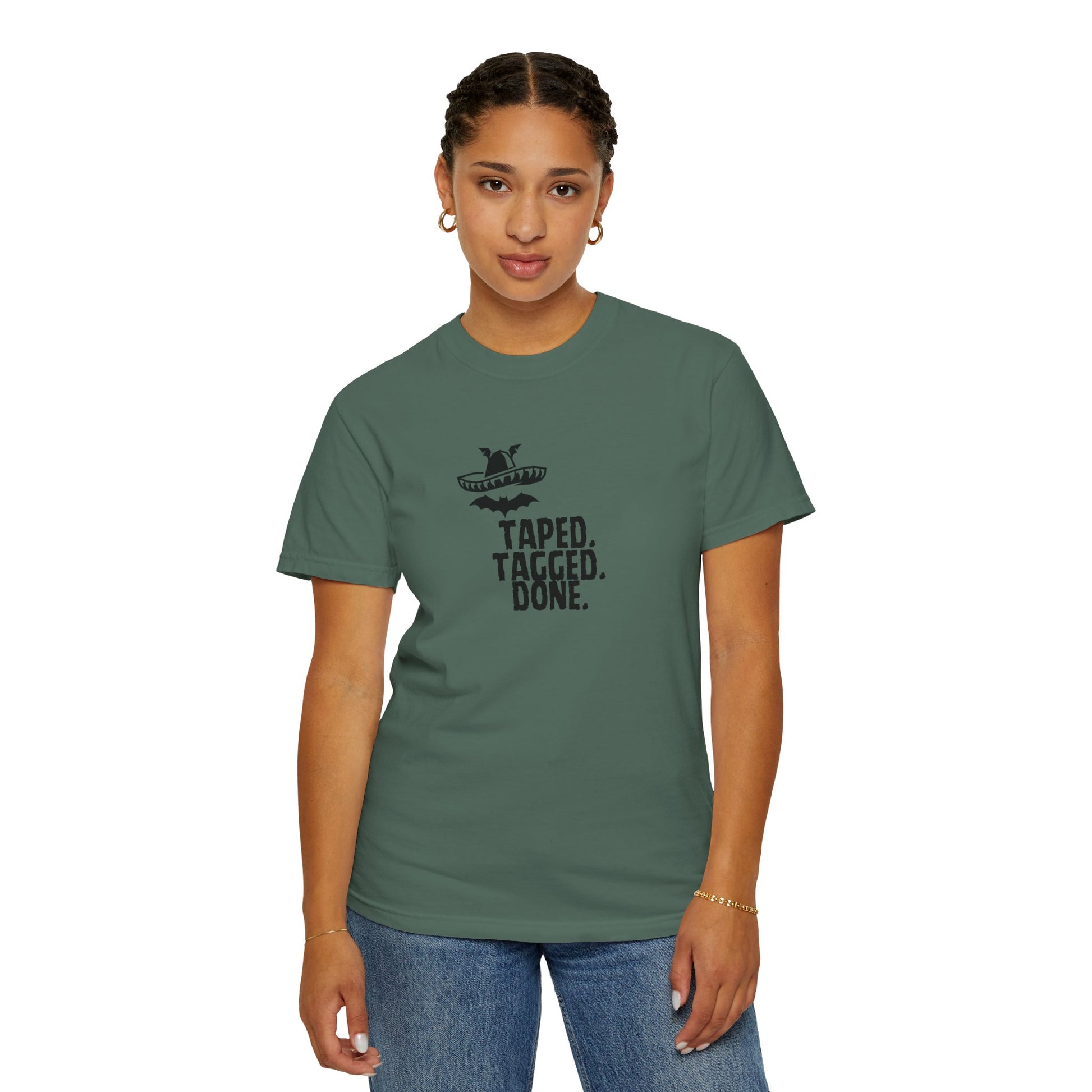 Flat lay of The Midnight Mariachi funny Mexican graphic tee with sneakers and accessories
