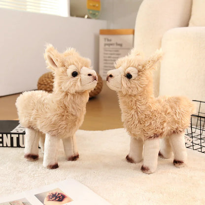 Fluffy alpaca plush toy displayed on a wooden shelf as home decor
