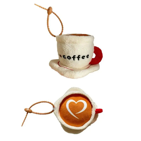 Fluffy sherpa latte art coffee cup plushie keychain in cream and red on white background