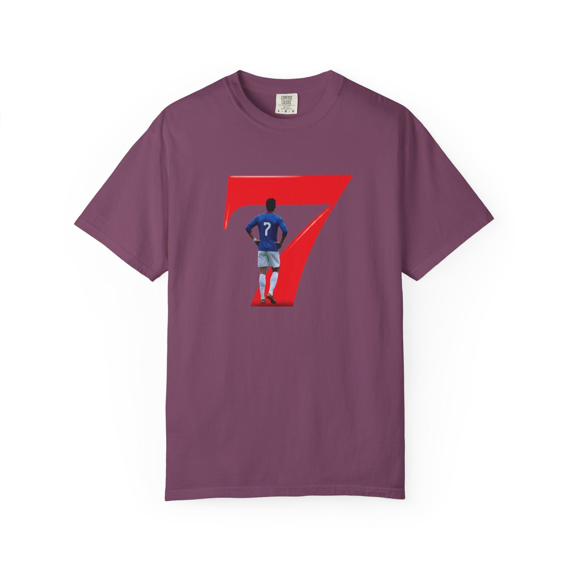 Footballer mid-celebration silhouette inside red number 7 on garment-dyed tee