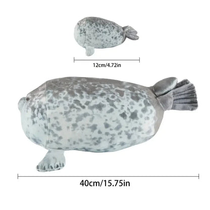 Four baby seal plushies removed from mama seal zipper tummy