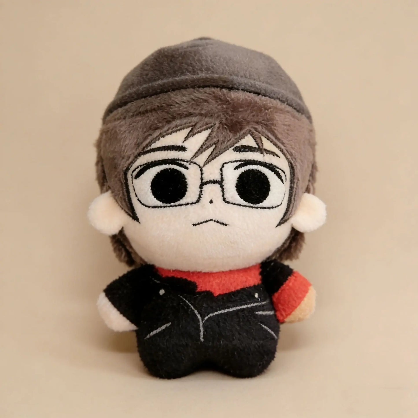 Frank plush 15cm doll with detailed punk-rock messy hair and eyeliner.