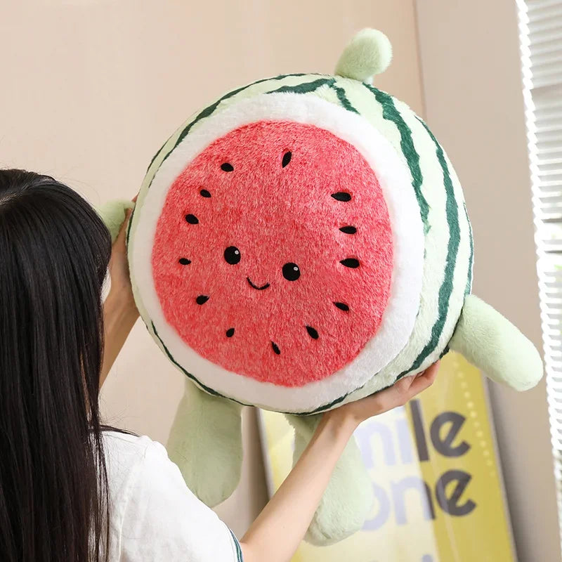 Fruit plush pillow green rind and red interior design detail shot
