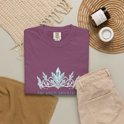 Full-length shot of a person wearing the white blue-crown graphic tee.