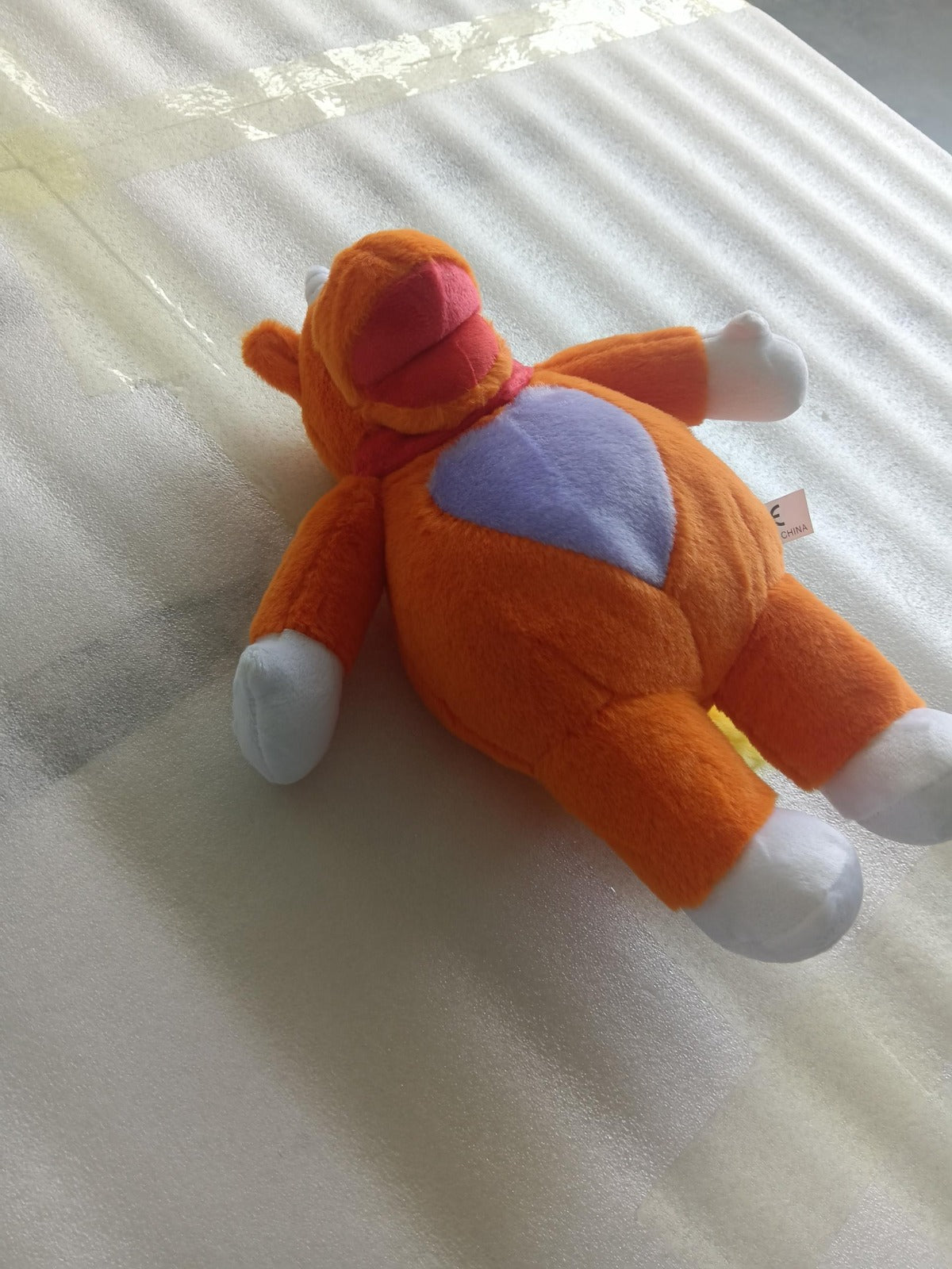 Full_body_shot_of_the_25cm_Buddy_the_Unicorn_plushie_a_must-have_indie_horror_merch_collectible_supplier_photo.