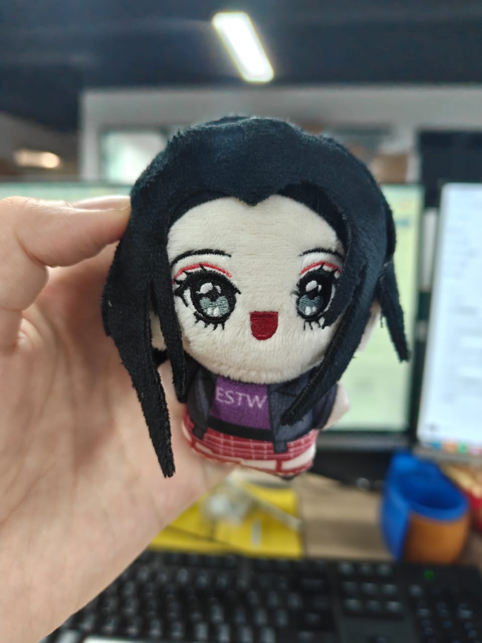 Full collection view of the Nana Osaki punk-rock vocalist plush and her matching black cat plush version.