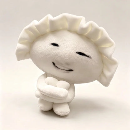 Funny gyoza plush keychain with abstract human-like face close-up