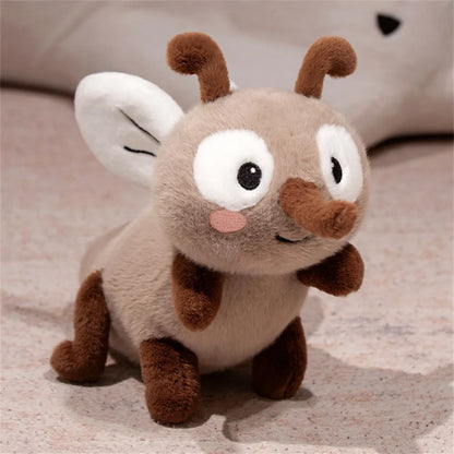 Funny insect toy mosquito meme plush on desk as novelty decor