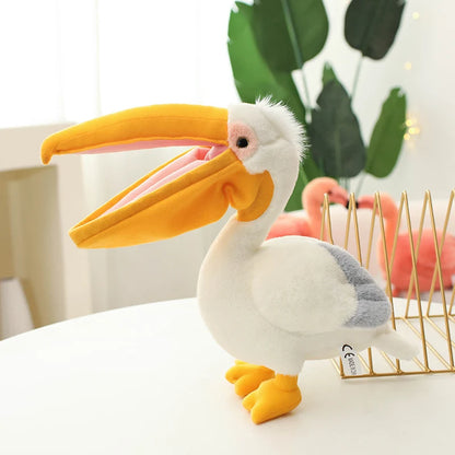 Funny pelican stuffed animal with soft open beak pouch on white background
