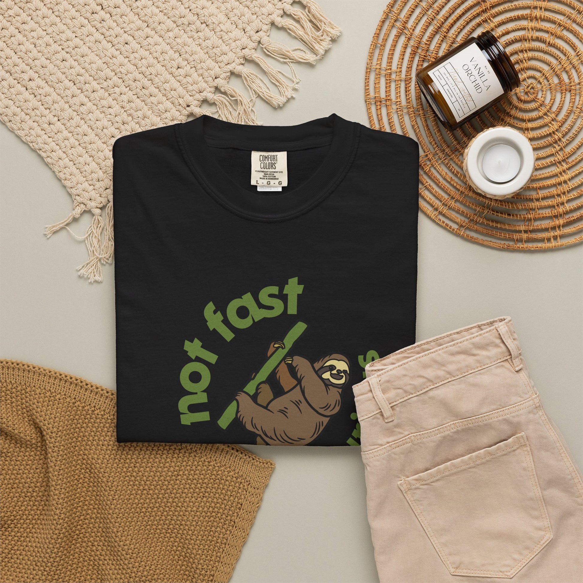 Funny sloth graphic tee gift wrapped for birthday presented on neutral background