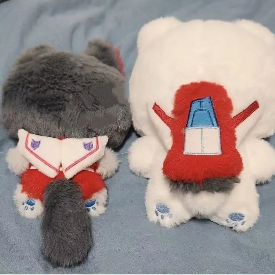 G1 Soundwave and Shattered Glass Soundwave plush side by side comparison
