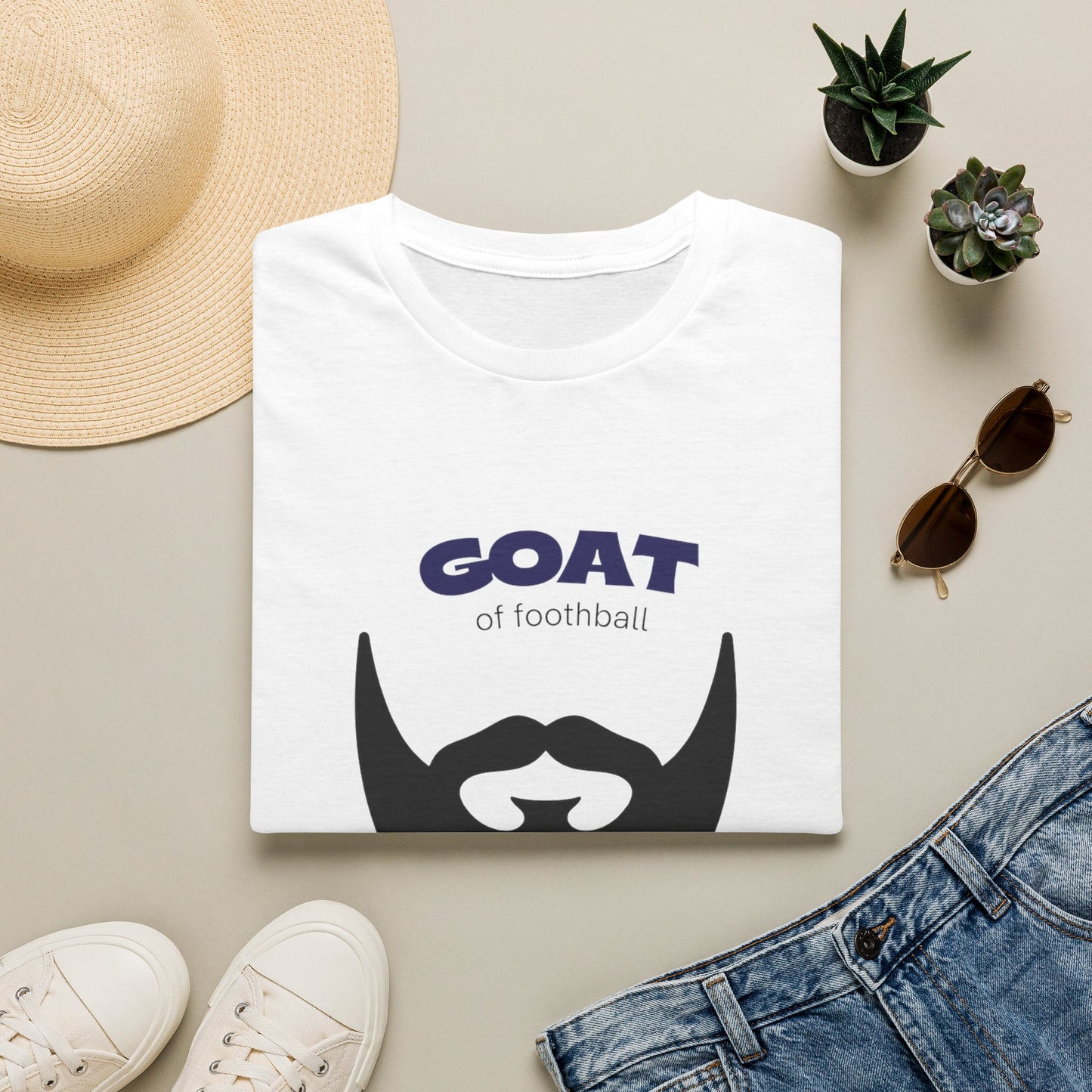 GOAT 10 shirt size chart flatlay XS to 5XL on neutral background