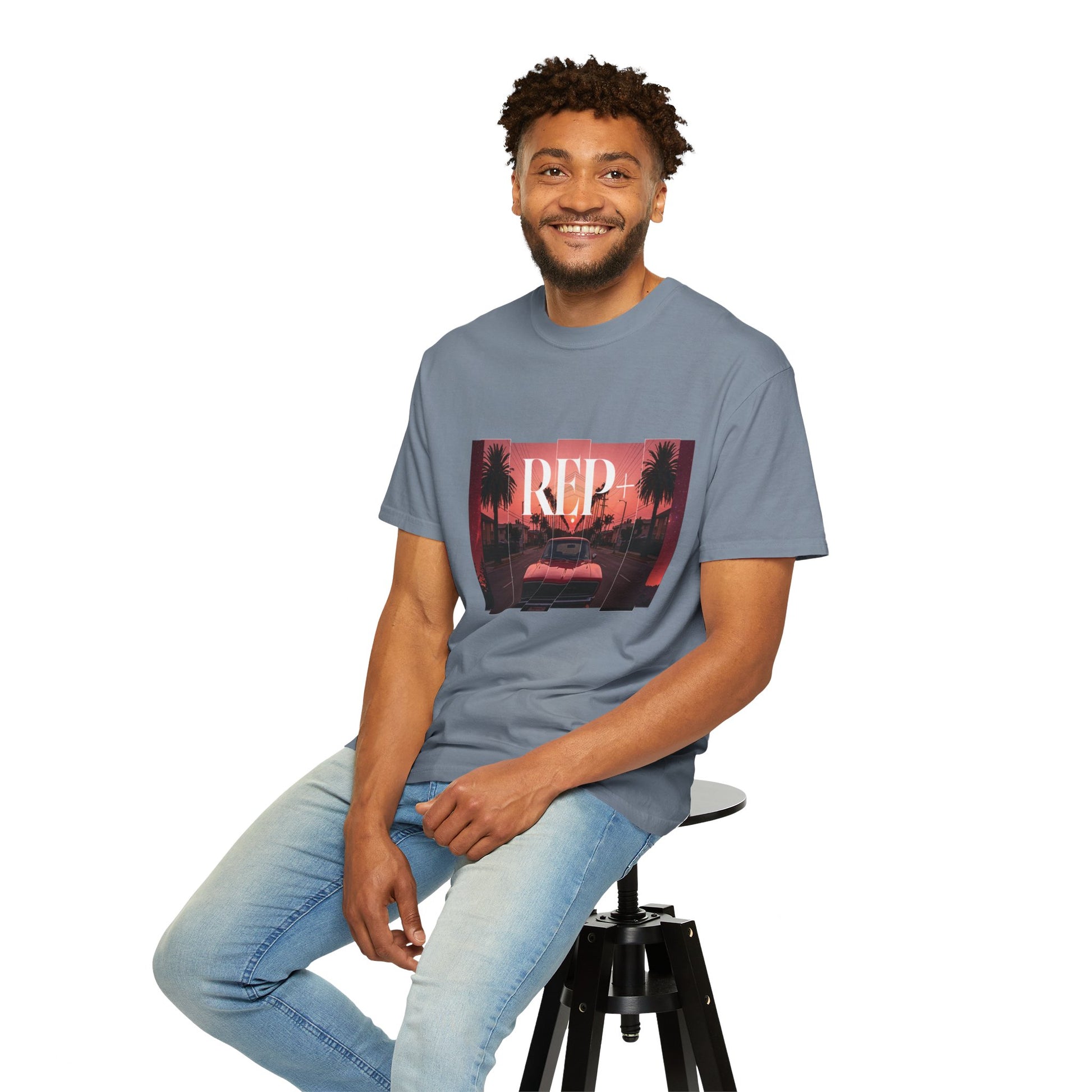 Garment-dyed synthwave tee with cinematic warm-toned sunset and muscle car design