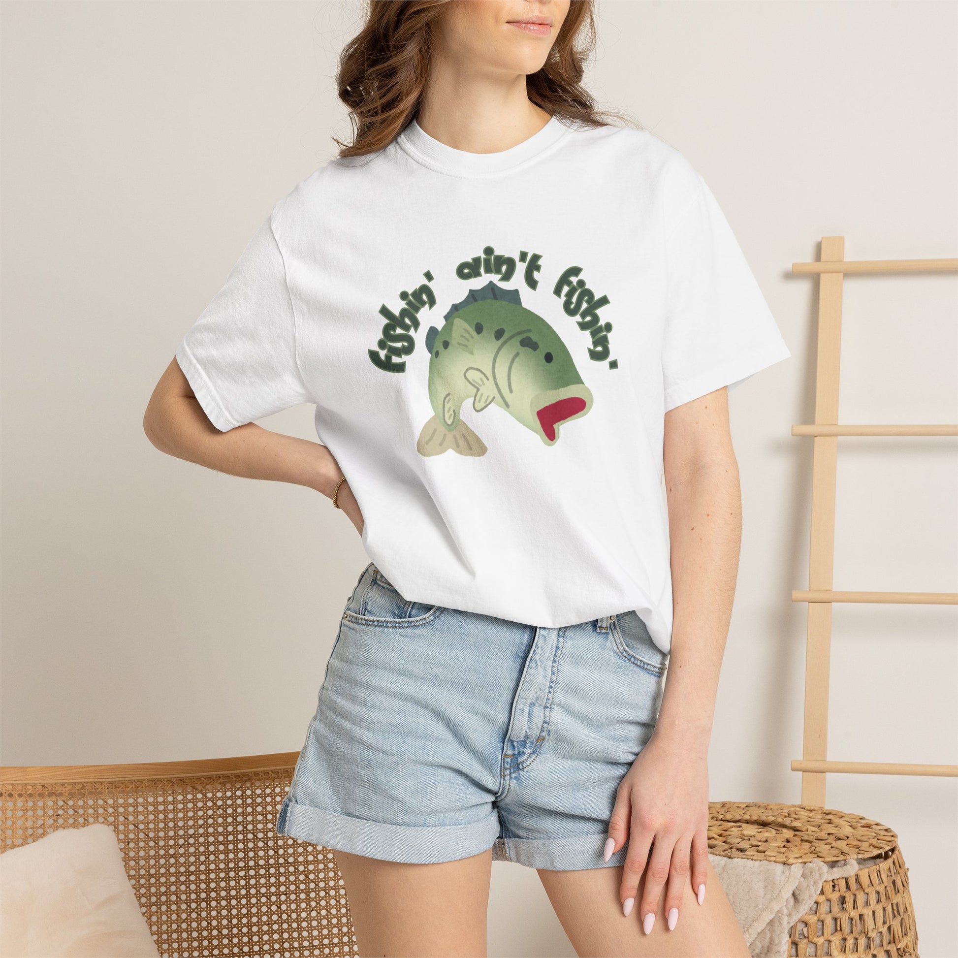 Garment dyed bass tee with fishin aint fishin slogan on cream background