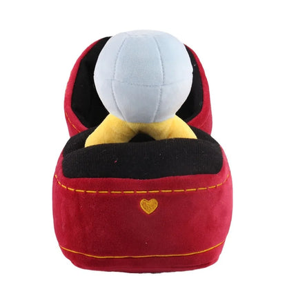 Giant plush diamond ring tucked inside open jewelry box plush on white background