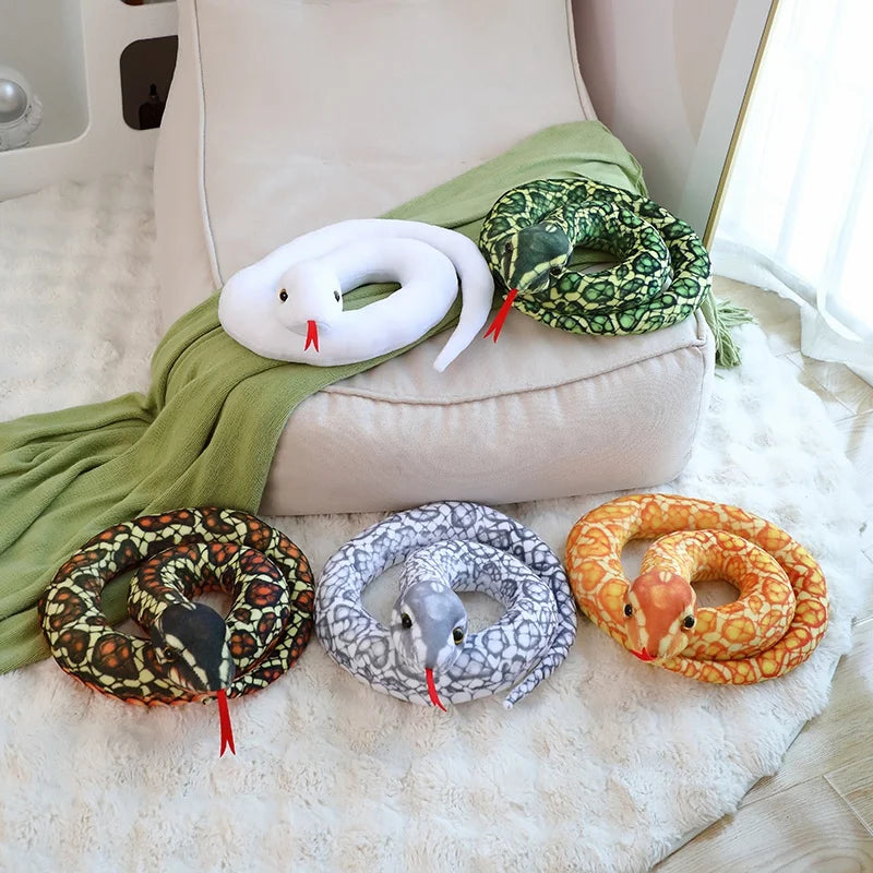 Giant python stuffed animal used as snake room decor gaming setup