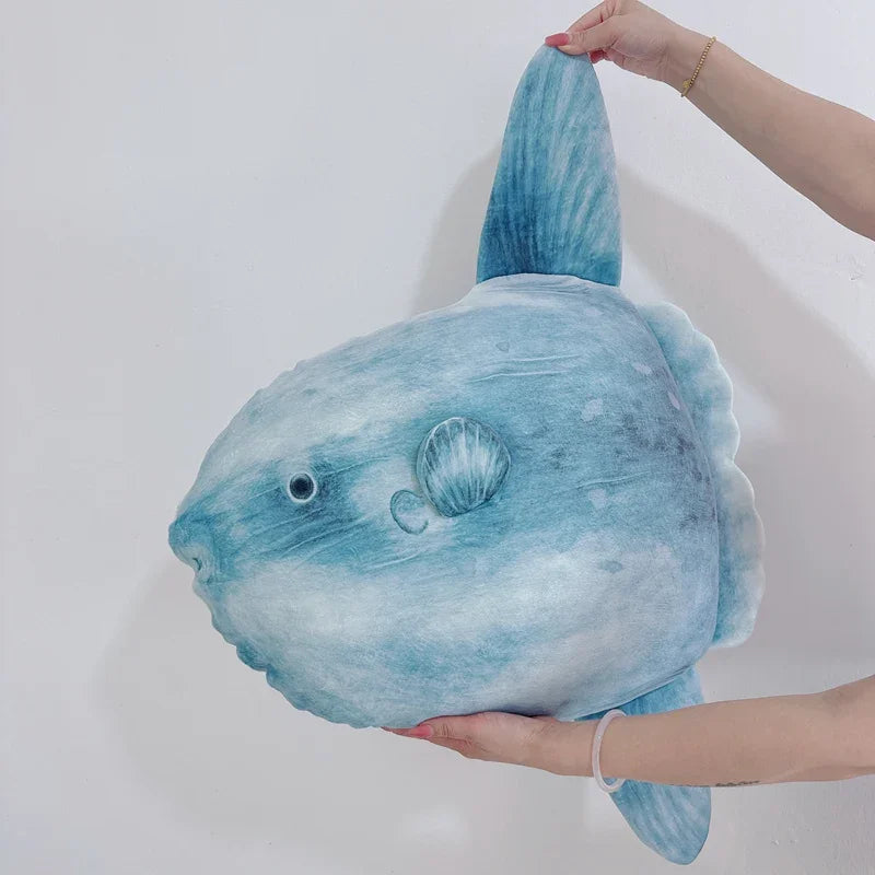 Giant sunfish stuffed animal next to hand for size reference 60cm