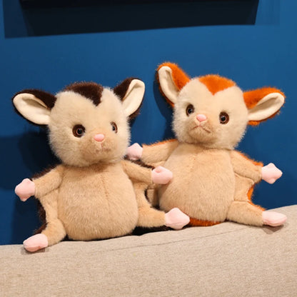 Glider plush front view showing dorsal stripe detail and round belly
