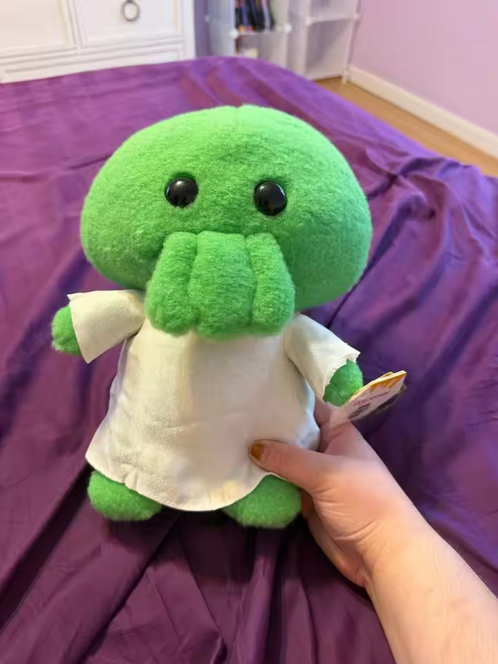 Goomi stuffed toy close-up grumpy face green monster plushie handmade