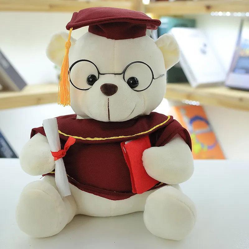 Graduation stuffed animal bear in brown with commemorative sash and diploma scroll accessory
