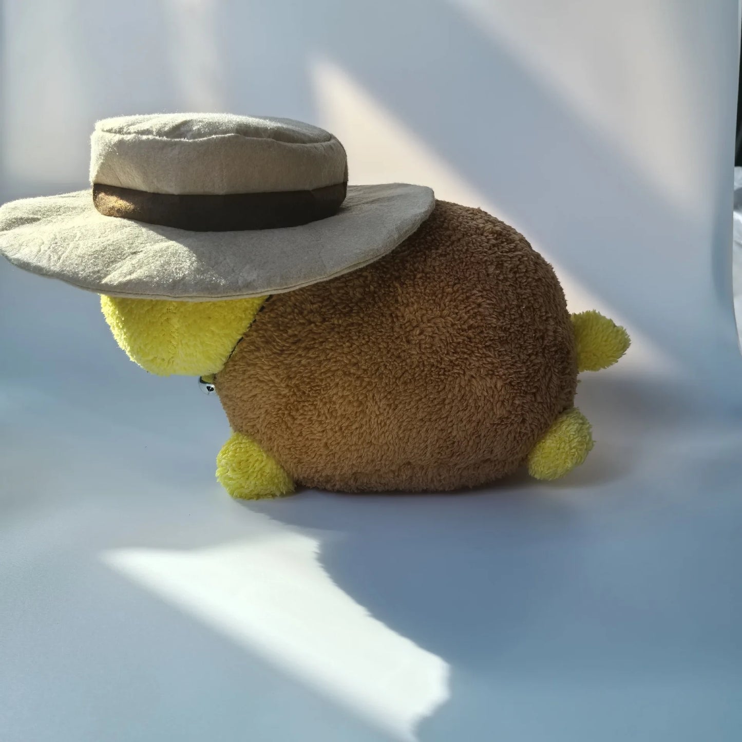 HWWHP Thomas plush with orange straw hat black band detail close-up