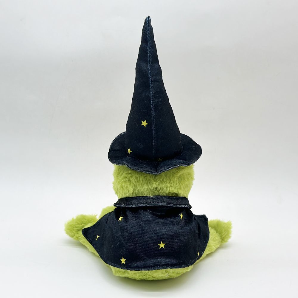 Halloween green frog wizard plush detail shot of star-print witch hat and flowing dark cape