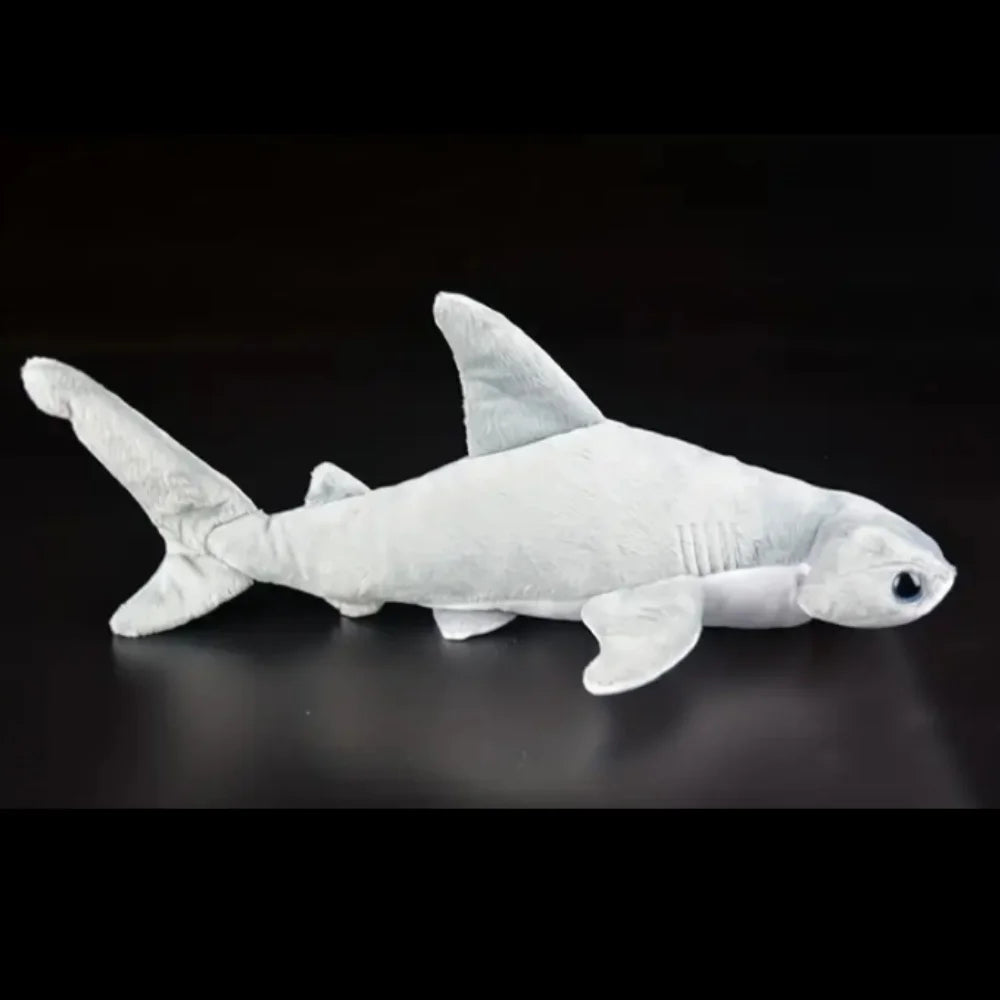 Hammerhead shark plush doll displayed on wooden shelf ocean room decor