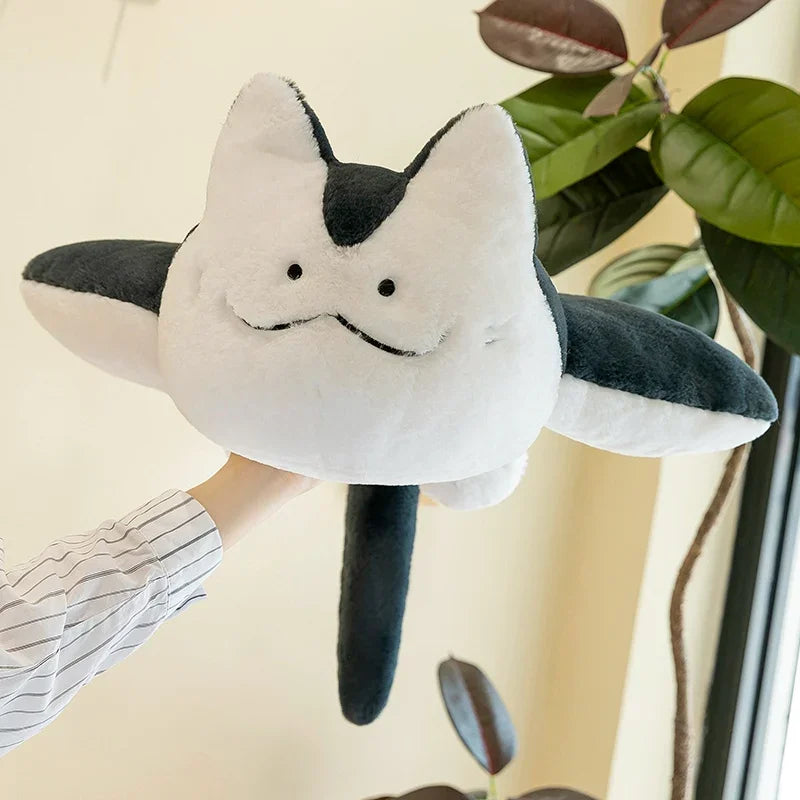 Hand holding 60cm manta ray plush pillow size comparison ocean animal plush