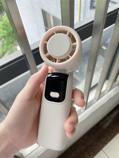 Handheld cooling fan with neck lanyard for hands free outdoor use
