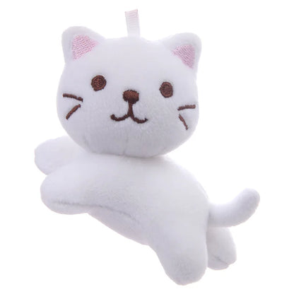 Handmade 12cm cat plushie shown against ruler for size reference