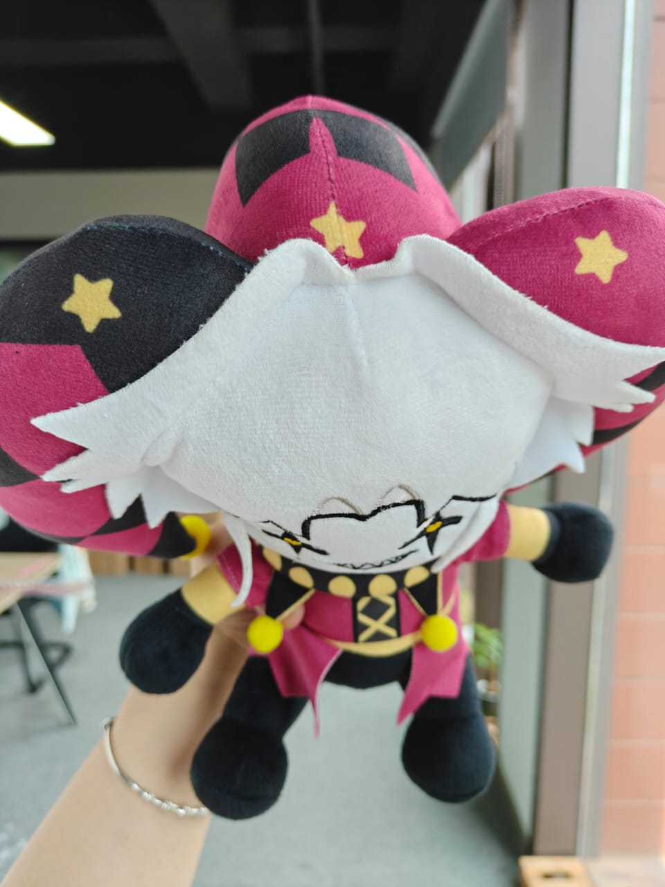 Handmade 25cm circus horror visual novel jester plush toy, showcasing detailed stitching and fabric work.