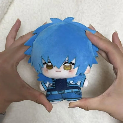 Handmade Aoba plush sitting on desk display shelf

