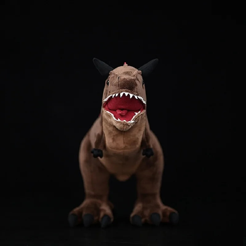 Handmade Carnotaurus stuffed animal front view showing distinctive double brow horns