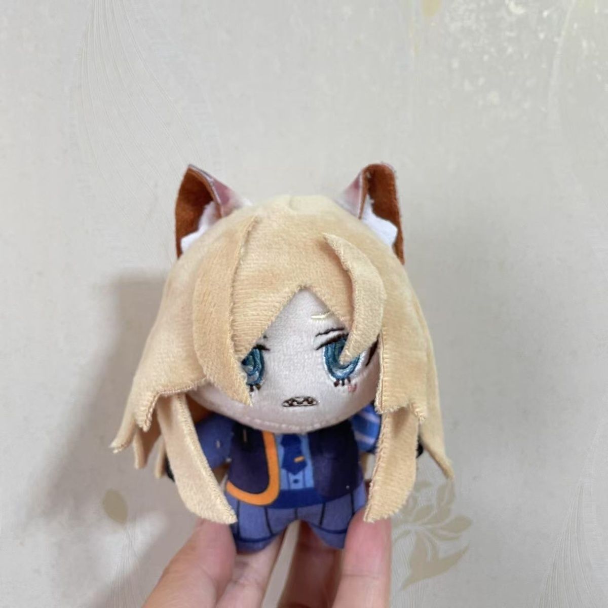 Handmade Kanna plush toy side profile view