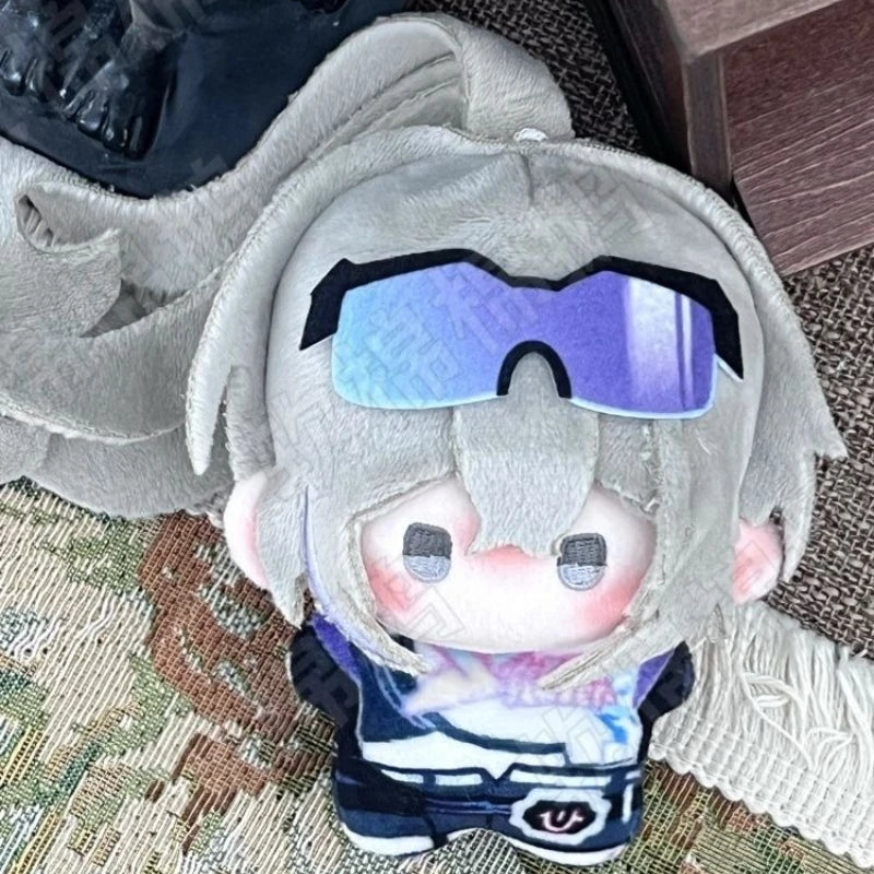 Handmade anime hacker plush sitting on a desk
