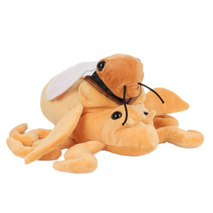 Handmade cicada stuffed animal with fabric wings and embroidered eyes